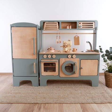 "Expand your child's imagination with Customizable Wooden Kids Play Kitchens. For toddlers, you can choose our wooden play kitchens. We also have wooden play kitchens for children older than 10 years. See this link to get the  Play Kitchen Tea corner stool set. https://www.etsy.com/listing/1512732640/microwave-and-hood-add-on-for-play Attention please :  -------------   All my models are on Instagram @annevetasarim page. I only list a few sample items on Etsy. Therefore, before or after ordering, check my instagram page and send me the screenshot of the model you want. To see our unique handmade wooden children's chair and table sets, click on this link or check out our @annevetasarim Instagram account: https://woodenkidschairs.etsy.com You can buy aprons and toys by clicking this link : h Kids Kitchen Set Up, Kitchen Play Area For Kids, Diy Kids Kitchen Set, Kids Kitchen Playroom, Play Kitchen Set Up, Kitchen With Hood, Diy Kids Play Kitchen, Kitchen Toys For Kids, Corner Stool