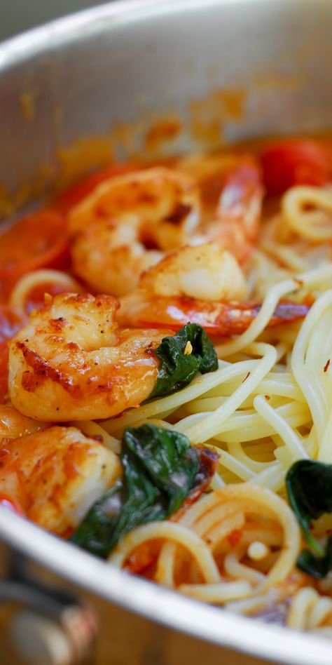 Garlic Shrimp Pasta in Red Wine Tomato Sauce comes together quickly in under 30 minutes! #shrimp #pasta #garlic #redwine #tomatosauce #redwine #basil Ingredients: shrimp, olive oil, Salt and Pepper, red pepper flakes, onion, garlic, tomato puree, diced tomatoes, red wine, basil, Italian seasoning, garlic powder Shrimp Fettucini, Red Wine Tomato Sauce, Pasta Garlic, Football Foods, Garlic Shrimp Pasta, Tomato Puree, Best Seafood Recipes, Shrimp Seasoning, Garlic Pasta