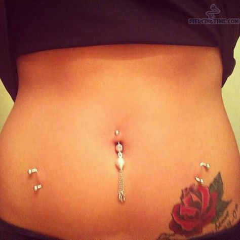 Rose tattoo. Belly piercing. Hip piercing. Dermals. Tattoo Belly, Hip Piercings, Hip Piercing, Surface Piercing, Jewelry Pictures, Face Piercings, With Tattoo, Dermal Piercing, Cute Piercings