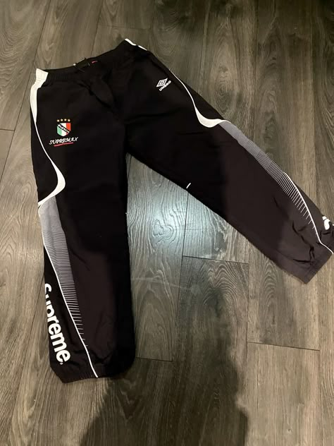 Supreme Supreme x Umbro Track Pants | Grailed Supreme Track Pants, Oversized Track Pants Outfit, Supreme Umbro Track Jacket, Track Pants Mens Street Style, Track Pants Outfit Mens, Umbro Outfit, Supreme Tracksuit, Umbro Tracksuit, Supreme Pants