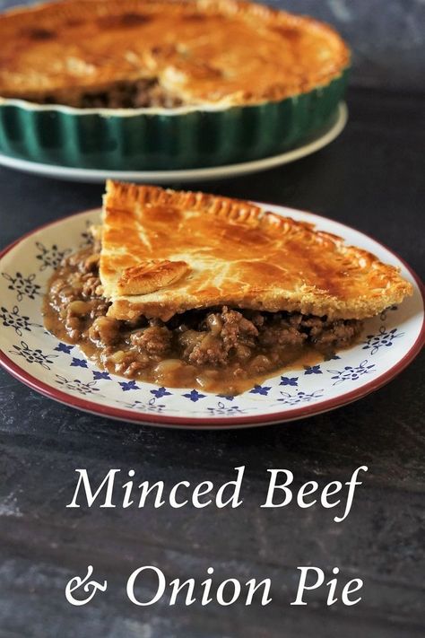 A plate with a portion of minced beef and onion pie, a dish with the rest of the pie behind Reheat Baked Potato, Minced Beef Recipes Easy, Minced Beef Pie, Picnic Pie, Veg Pie, Potato Baked, Minced Beef Recipes, Sausage Meat, Meat Pie Recipe