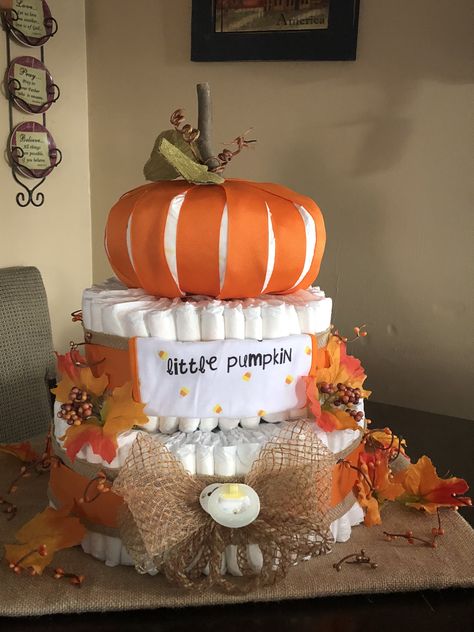 Diaper Cake Pumpkin Theme, Fall Baby Shower Diaper Cakes, Diaper Cake Fall Theme, Cake Pumpkin Theme, Pumpkin Diaper Cake Girl, Fall Baby Shower Cakes Girl, Little Pumpkin Diaper Cake, Pumpkin Themed Baby Shower Ideas, Halloween Diaper Cake