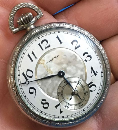 Check out this vintage Waltham pocket watch from 1925! With a beautiful silver dial and 7 jewels, it's the perfect addition to any collection. This mechanical hand-winding watch comes with a screw-back case and a half-hunter closure. Don't miss out on this rare find! #Waltham #PocketWatch #Vintage #SilverDial #Luxury #MechanicalWatch #eBay #HalfHunter #Silver #SilverPlated #Waltham #PocketWatch #Luxury #Silverplated #Hand-winding #Analog #Screwback #shopvintage80 #shopvintage #Holiday http... Mechanical Hand, Pocket Watch Antique, Mechanical Watch, Luxury Accessories, Silver Watch, Vintage Watches, Pocket Watch, Accessories Watches, Time Piece