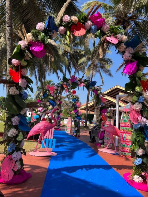 Carnival Entrance Decor, Flamingo Wedding Decor, Haldi Carnival, Sangeet Setup, Dhoti Function, Beach Carnival, Entry Arch, Beach Setup, Flamingo Wedding