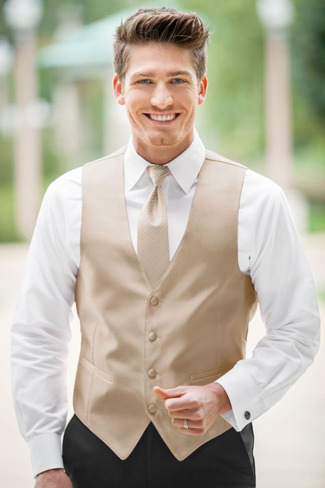 As handsome as can be! Happy and anticipating groom wearing a champagne vest and tie. Ready for action! Groomsman Attire, Groomsmen Vest, Wedding Vest, Grey Prom Dress, Formal Tuxedo, Tuxedo Vest, Wedding Dress Champagne, White Tuxedo, Black Tux