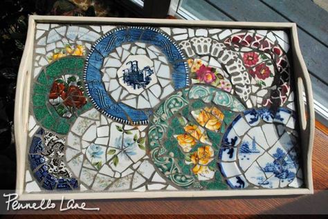 Making mosaics out of china has to be one of the most enjoyable crafts I’ve tried.  Here’s a tea tray I made using china plates and saucers.  It started when I broke one of my mother&#8… Broken China Crafts, Mosaic Tray, China Crafts, Mosaic Madness, Mosaic Stained, Mosaic Art Projects, Broken China Jewelry, Broken China, Plate Art