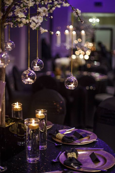 May 1st Black and Gold, Gatsby event, styled by Luxury Events Group. The Venue, Grand Station, was stunning and our styling added a touch of glamour to this traditional and sought after building based in the heart of Wolverhampton. For more information go to: www.luxuryeventsgroup.co.uk  All photography is courtesy of Stephen McGowan Photography http://www.mcgowanweddings.co.uk/ #blackandgold #gatsby #venue #venueinspo #weddinginspo #party #styling Masquerade Themed Wedding, Purple Black And Gold Masquerade Party, Purple Gold Black Party, Black Gold Purple Party Decor, Black White Gold Purple Wedding, Purple Gold And Black Party Decorations, Black And Purple Quinceanera Theme, Black Purple And Gold Wedding, Purple Event Decor