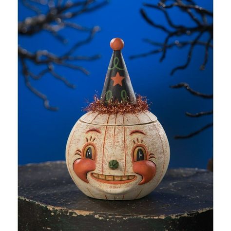 "Johanna Parker's folk art captures the mischievous spirit of Halloween!  The hand painted reproductions are artisan crafted with attention to detail and unique embellishments. These spooktacular characters will spread smiles and cheer for every generation.  Design: Jackie White-O-Ween Jar  Item No. JP9240 Materials: Hand-painted resin, tinsel Dimensions: 5.75\" X 3.5\" X 3.5\" New with tags   Collectible item to    Use as is, in arrangements or fill" Bethany Lowe Halloween, Bethany Lowe Designs, Halloween Folk Art, Johanna Parker, Painted Pumpkin, Zucca Halloween, Manualidades Halloween, Bethany Lowe, Fancy Hats