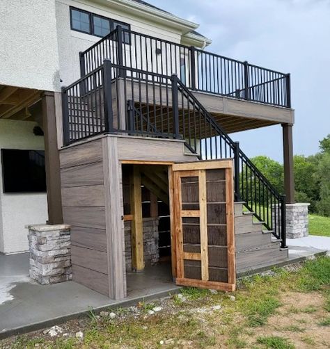 8 Ways To Get Under-Deck Storage – Forbes Home Stairs Porch, Under Deck Storage, Patio Under Decks, Outdoor Staircase, Patio Stairs, Wood Decks, External Staircase, Deck Seating, Porch Storage