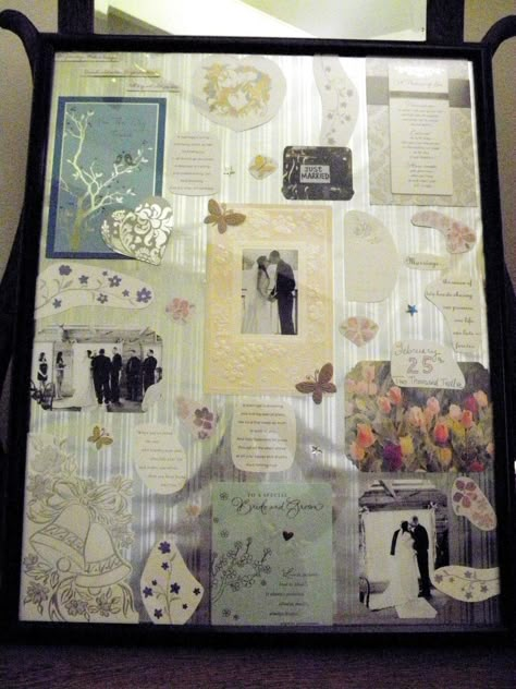 I thought it was silly to keep all of our cards from our wedding in a box forever, when some are quite beautiful. So, I decided to make a collage with bits and pieces from our cards and some wedding pics. I bought a poster frame from Walmart, used silver wrapping paper for the background, and stuck everything on with double-sided tape. Much nicer to have these on display rather than in a box taking up storage space! Wedding Card Keepsake Ideas, Card Keepsake Ideas, Wedding Card Keepsake, Wedding Cards Keepsake, Wedding Storage, Wedding Party Dress Guest, Collage Idea, Card Collage, Memory Collage