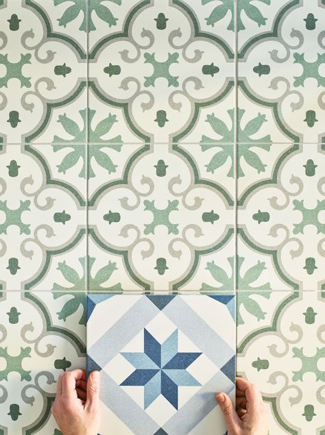 Porcelain is a great option for areas that get a fair amount of footfall; they are almost impervious to staining and if patterned, great at hiding a little day to day dust. Our decorative Vaporetto tiles come in a series of designs and in two colourways that work equally well on walls and floors. The main area here is the Burani option in the Grass shade, with our stylist holding a Rialto decor in the Lagoon hue. Vintage Tegel, Wet Room Flooring, Tiles Ideas, Hallway Flooring, Patterned Floor Tiles, Moroccan Tiles, Green Collection, Square Tile, Porcelain Flooring