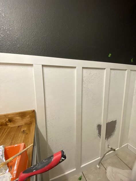 This project is an easy way to install your own "board" and batten. There are no boards, only battens made from inexpensive MDF! Let's get into the steps you need to install your own!   You'll need joint compound and a knockdown knife and, if needed, drywall repair kits. I had two holes to cover. The paint I used for the top part of the walls was Sherwin Williams "Carbonized". Determine how far up the battens are going to go and mark. If you have textured walls, use joint compound to s… Textured Walls Board And Batten, Batton Board On Textured Walls, Board And Batten Wall With Textured Walls, Textured Board And Batten, How To Update Textured Walls, Covering Up Textured Walls, Board And Batten On Plaster Walls, Cover Up Textured Walls, Textured Walls In Bathroom