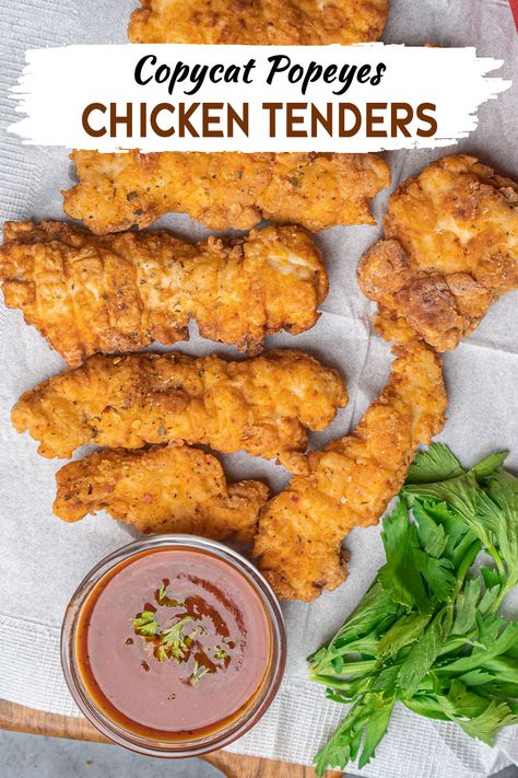 Indulge in the spicy, crunchy goodness of Copycat Popeyes Chicken Tenders. This homemade version captures the unique flavor and texture of the beloved snack. Copycat Popeyes Chicken Tenders, Popeyes Spicy Chicken Tenders Recipe, Popeyes Chicken Tenders Recipe, Homemade Breaded Chicken Tenders, Popeyes Chicken Tenders, Popeyes Chicken Recipe, Copycat Popeyes Chicken, Tenders Recipes, Spicy Chicken Tenders