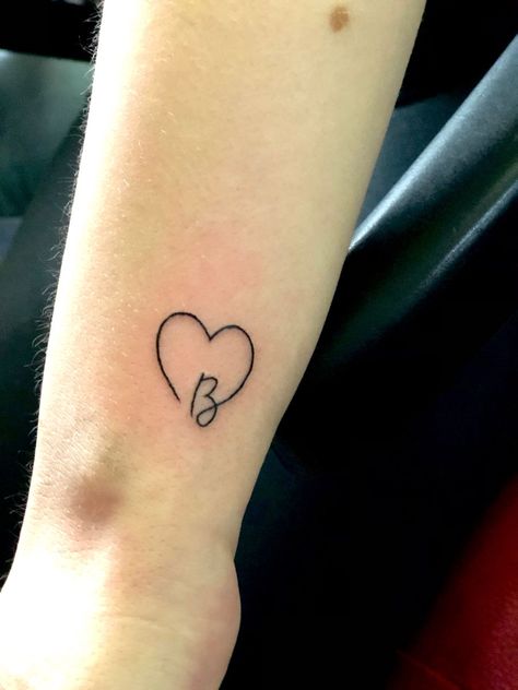 Smal tattoo on the wristLetter B heart Heart With B Tattoo, Initial Inside Heart Tattoo, Cursive D Tattoo With Heart, Heart With D Tattoo, Cute Initial Tattoos Heart, H Heart Tattoo, Initial B Tattoo Ideas, B With A Heart Tattoo, Small Heart Tattoo With Initials