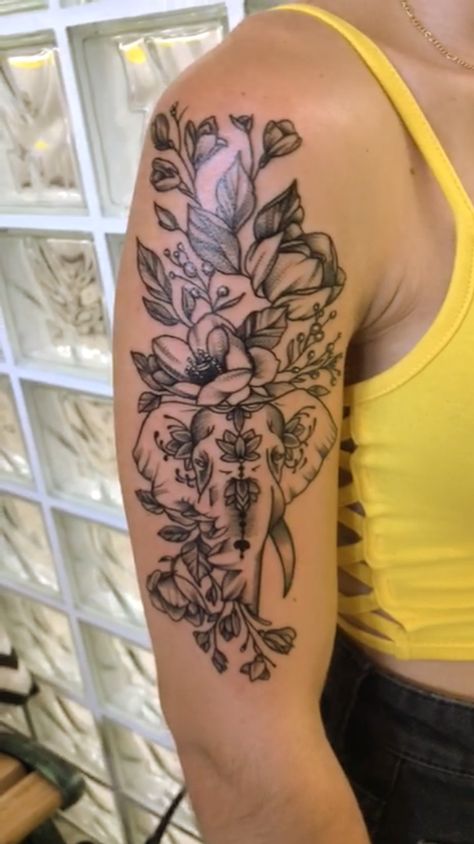 Elephant Bicep Tattoo Women, Delicate Elephant Tattoos For Women, Tropical Elephant Tattoo, Elephant Tattoos Upper Arm, Elephant Upper Arm Tattoo, Wildflower Arm Tattoo Half Sleeves, Elephant Tattoos With Flowers Forearm, Elephant Half Sleeve Tattoos For Women, Shoulder And Upper Arm Tattoos For Women Unique