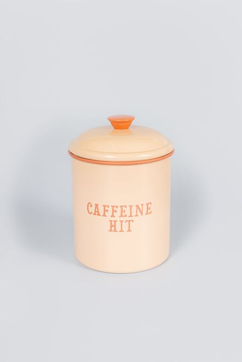 Organise your coffee stash with this pastel canister from Yvonne Ellen. Its vintage enamel look, complete with a cheeky slogan, adds a playful touch to any kitchen. Keep your coffee fresh and add a touch of whimsy to your home. Create a full set with our tea and sugar canisters too! 11CM X 15.5CM Wash gently in warm so Fun Kitchen Ware, Yvonne Ellen, Xmas Gift Guide, Sugar Canister, Coffee Canister, What A Girl Wants, Vintage Bone China, College Apartment, Kitchen Canisters