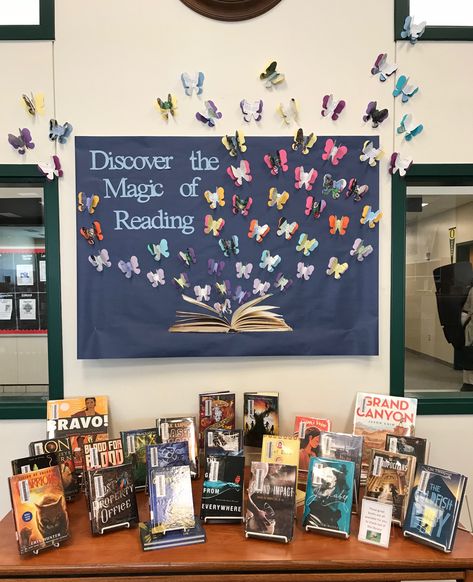 Spring Library Board Discover the Magic of Reading display.  Used old books to cut out the 'inside' butterflies.  The book was printed out on a color printer, half at a time. Spring Library, School Library Book Displays, School Library Bulletin Boards, School Library Decor, Reading Display, School Library Displays, Library Bulletin Board, Reading Bulletin Boards, Library Themes