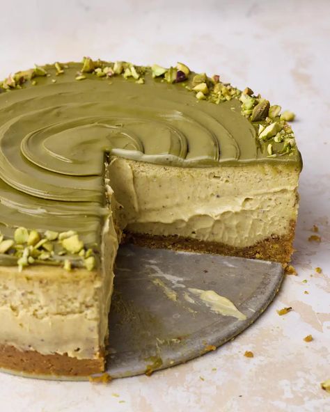 This easy pistachio cheesecake is a baked cheesecake with pistachio graham cracker crust, pistachio cheesecake filling and topped with pistachio cream and chopped pistachios. With pistachio paste in the cheesecake batter and pistachio cream on top, this delicious dessert is packed with pistachio flavor. Delicious dessert for dinner parties or holidays. Cheesecake Recipes Pistachio, Pistachio Cream Cheesecake, Pistachio Spread Uses, Pistachio Cheesecake No Bake, Pistachio Butter Uses, Pistachio Cream Dessert, Dessert Pistache, Pistachio Cake Filling, Pistachio Cream Recipe