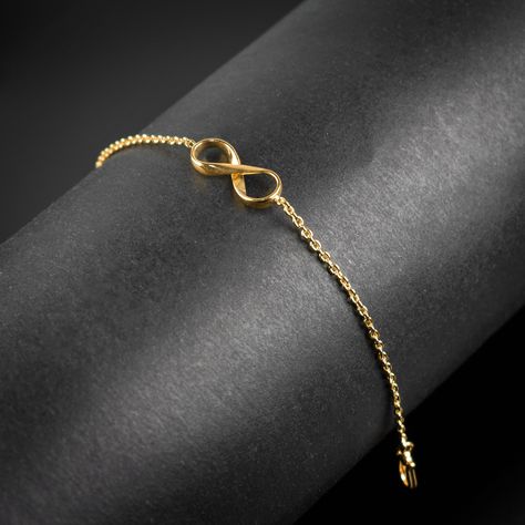 GemFormingStudio D E T A I L S Gift Infinity Bracelet-Gold Infinity Bracelet-Dainty Linked Infinity Bracelet-Feather Bracelet-Eternity Bracelet- Infinity Gift-Gift For Her [GFS4651] Stone Name : Without Gemstone Weight: 3.62 gm Material: Brass Polish: All Plating are Available . Contact us for wholesale prices. R I N G S https://www.etsy.com/in-en/shop/GemFormingStudio?section_id=22783374 B E A D S https://www.etsy.com/in-en/shop/GemFormingStudio?section_id=22828835 W A N D S https://www.etsy.co Gold Infinity Bracelet, Delicate Gold Bracelet, Brass Polish, Eternity Bracelet, Linked Bracelet, Gold Bracelet Simple, Dainty Gold Bracelet, Feather Bracelet, Gold Chain Jewelry