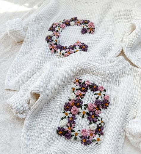 Hand Embroidered Baby Initial Sweater - Floral Monogram Sweater Message for customization & sweater, and yarn color availability! Monogram Ideas For Clothes, Embroider Baby Sweater, Hand Embroidery Christmas Sweatshirt, Hand Embroidery Baby Clothes, Embroidery Kids Clothes, Hand Embroidery Sweater, Sweater Embroidery Ideas, Embroidery Baby Clothes, Name Sweater Baby