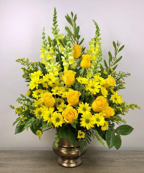 Honor a bright spirit who was like a ray of sunshine to everyone they encountered, with a grand display of bold yellow blossoms. At more than three feet tall, it will add a touch of brightness to any tribute.   SKUs: ,T219-1A Yellow Floral Arrangements, Diy Silk Flower Arrangements, Yellow Flower Arrangements, Tall Flower Arrangements, Sympathy Floral, Arreglos Ikebana, Sympathy Arrangements, Sunflower Arrangements, Large Floral Arrangements