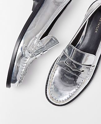 Enhanced with metallic sheen, our gathered seam penny loafers enrich your look from head to toe. Round toe. Padded footbed for complete comfort. 3/4" heel.,Imported:Imported,Fabrication:Faux Leather Metallic Gathered Seam Penny Loafers by Ann Taylor Size regular - 5 Silver Metallic Women's Low/Flats, Flats, Footwear, Faux, Leather Silver Loafers, Knitted Suit, Loafers Online, Detail Shop, Penny Loafers, Double Knitting, Stylish Women, Ann Taylor, Penny