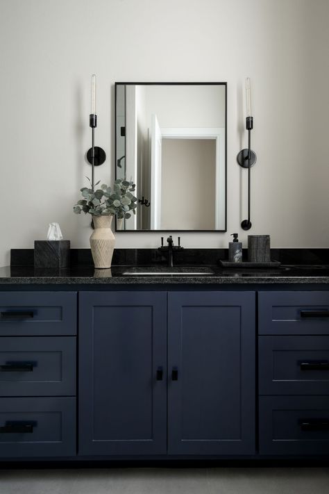 These blue cabinets create such a charming vibe in this bathroom 🤩🖤  #micahandco #timelesswithanedge  Designer/Design Firm: @micahabbanantoandco Builder: @jaggershomedesign Photography: @ktminteriors Navy Blue Bathroom Cabinets, Navy Bathroom Cabinets, Dusty Blue Bathroom, Blue Bathroom Cabinets, Dark Blue Bathroom Vanity, Secret Basement, Dark Blue Bathrooms, Grey Bathroom Cabinets, Grey Cupboards