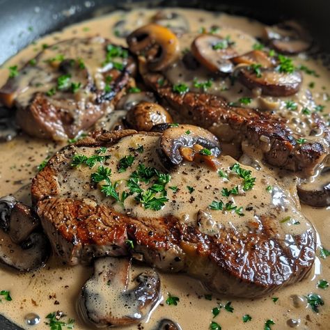 🥩 Experience the ultimate indulgence with our Pan-Seared Garlic Butter Steak with Mushroom Cream Sauce! 🥩✨ #SteakLovers #GourmetMeals Pan-Seared Garlic Butter Steak with Mushroom Cream Sauce Ingredients: Ribeye steaks (2) Butter (1/4 cup) Garlic cloves, minced (4) Mushrooms, sliced (2 cups) Heavy cream (1 cup) Olive oil (2 tbsp) Salt (1 tsp) Black pepper (1/2 tsp) Fresh parsley, chopped (for garnish) Instructions: Heat olive oil in a skillet over medium-high heat. Season steaks with salt ... Steak And Vegetables, Steak With Mushrooms, Mushroom Steak, Mushroom Dishes, Mushroom Cream Sauce, Delicious Steak, Steak Side Dishes, Butter Steak, Easy Steak Recipes