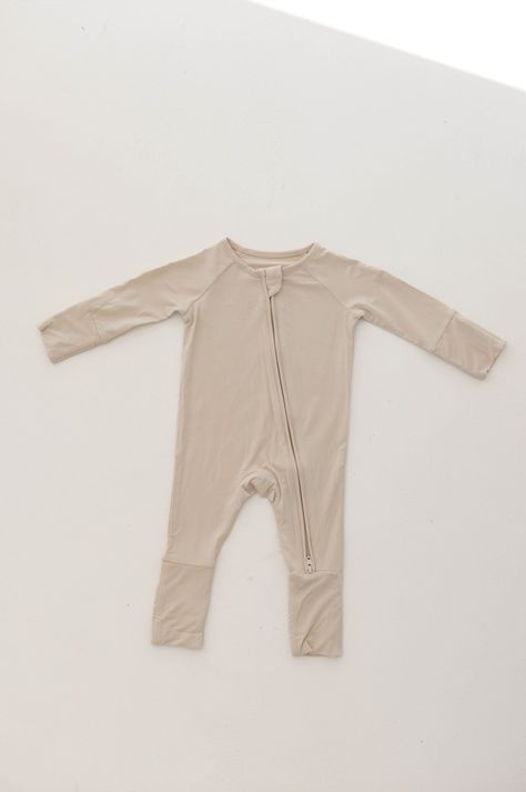 Made of the softest premium bamboo. Durable and well designed your little ones can sleep and play in these cozy pajamas. Our smallest sizes have rollover cuffs on the hands and all of the one piece sizes have cuffs on the feet giving you the option to go footless or footed without changing outfits. Sizes available in newborn - 24 months Material : 95% bamboo viscose / 5% spandexA key benefit of bamboo clothing is that it is naturally hypo-allergenic, gentle on the skin, and highly breathable. It keeps skin cool in summer and warm in winter by wicking away any excess moisture. No need for both summer and a winter wardrobe – with bamboo clothing you babe will you be comfortable year round.Care Instructions : Wash with like colorsTumble dry on low or hang dryExclusively available at Forever F