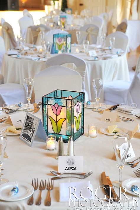 Simple table setting with custom hand made stained glass lanterns by the M.O.B… Stain Glass Wedding Decor, Stained Glass Simple Ideas, Stained Glass Table Decor, Stained Glass Centerpieces, Stain Glass Lanterns, Stained Glass Home Decor, Wedding Stained Glass Ideas, Stained Glass Wedding Decor, Stained Glass Art Diy