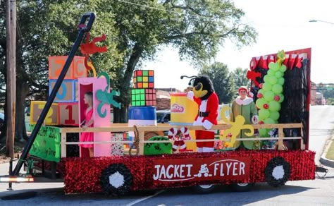 Christmas Floats Parade Ideas Easy Cheap, Radio Flyer Christmas Float, 70s Parade Float, Toyland Christmas Theme Float, Toyland Parade Float Ideas, Christmas In Toyland Float Ideas, Disney Parade Float Ideas, Toy Story Parade Float Ideas, Christmas Floats Parade Ideas Easy