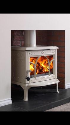 Our stunning Jotul F100 in ivory enamel is coming to you very soon from #Norway..http://jotul.com/uk/products/wood-stoves/Jotul-F-100 Fireplace Styling, Victorian House Renovation, Wood Burning Stoves Living Room, Granite Hearth, Modern Stoves, Stoves For Sale, 4 Season Room, Wood Burning Stoves, Wood Fuel