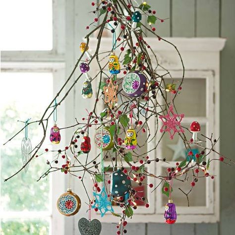 Would be lovely over the seasonal table. Holiday Tree Alternatives, Mobile Christmas Tree, Hanging Branch Christmas Tree, Alternative Xmas Trees, Alternative Christmas Tree Topper, Christmas Decor Ideas No Tree, Displaying Christmas Ornaments Without Tree, Alternative For Christmas Tree, Christmas With No Tree