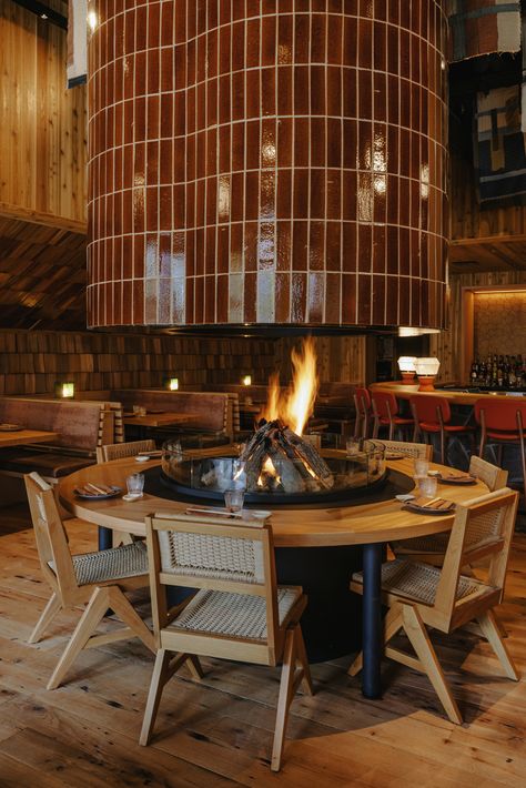 Floating fireplace design in a restaurant. Karaoke Room, Japanese Dining, Noodle Bar, Banff Alberta, Booth Seating, Glazed Ceramic Tile, Sushi Restaurant, Bar And Restaurant, Sushi Restaurants