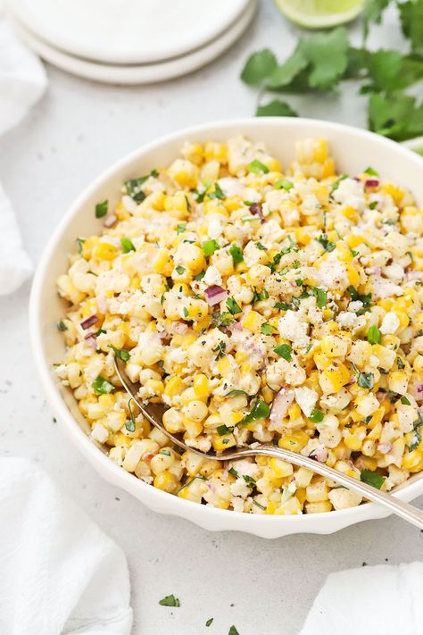 This Mexican Street Corn Salad recipe is loaded with all the flavors of elote and esquites. You'll love the fresh flavors of this salad--tangy crema dressing, cotija cheese, cilantro, chili and lime! It's everything you love about authentic mexican street corn, packed into an easy summer salad that's perfect for BBQs, potlucks, and picnics. Get this easy corn salad recipe and more summer salads to try at One Lovely Life Elote Salad Recipe, Authentic Mexican Street Corn, Esquites Recipe, Elote Salad, Honey Lime Tilapia, Street Corn Salad Recipe, Corn Salad Recipe Easy, Mexican Street Corn Salad Recipe, Easy Corn Salad