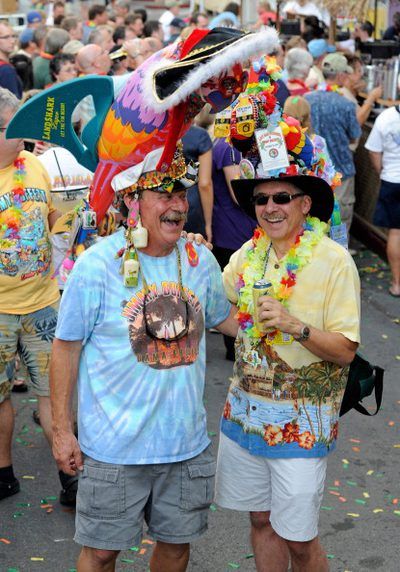 Jimmy Buffett fans Margaritaville Outfit Ideas, Parrothead Outfit, Jimmy Buffet Costume Ideas, Parrot Head Jimmy Buffet Outfit, Parrothead Hat, Margaritaville Party Outfit, Jimmy Buffett Concert Outfit, Jimmy Buffett Tailgate, Parrothead Party