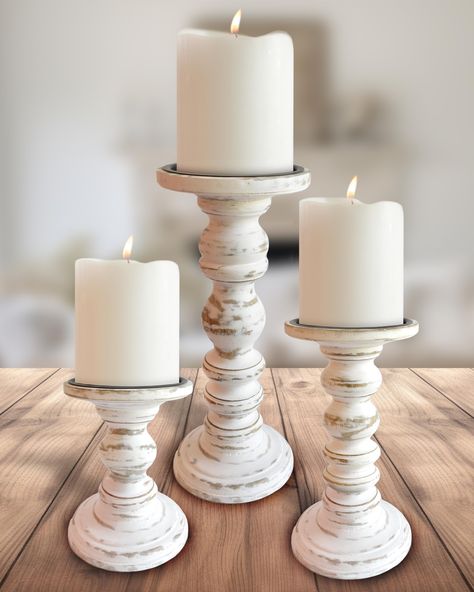 PRICES MAY VARY. BEAUTIFUL AND FUNCTIONAL: Our Hand Carved Wooden Candle Holders for Pillar Candles are hand carved from sustainable solid mango wood. This exquisite set is unlike any other set you will find, as they are designed to hold both 3 inch, or the larger, 4 inch wide pillar candles (candles sold separately). COZY CHARMING GLOW: Our Modern Farmhouse Decor Pillar Candle Holders can be used for your Fireplace Mantle Decor, Dining Table Centerpiece Decor, Table Decor for Living room. Or an Wooden Candlestick Holders, Candle Modern, White Candle Holders, Wooden Candle Sticks, Wood Candle Sticks, Wooden Candle Holders, Wood Candle Holders, Wooden Candles, Decor Pillows