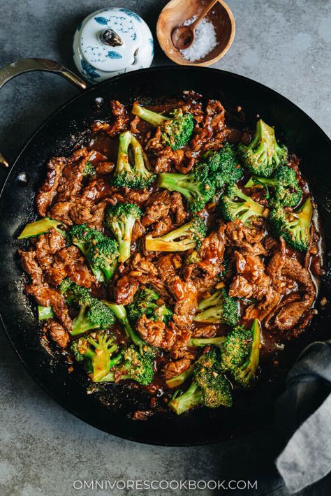 This beef and broccoli is a popular Chinese take-out meal and it's also easy enough to make at home. It's also healthier than most take-out meal options. With juicy tender beef and crisp broccoli brought together in a rich brown sauce, this quick dinner is as colorful as it is delicious. Serve it over hot rice for an authentic Chinese take-out dinner. {Gluten-Free Adaptable} Meal Ideas Steak, Beef And Broccoli Skillet, Sticky Beef And Broccoli, Dutch Oven Beef And Broccoli, Easy Dinner With Steak, Steak And Broccoli Rice Bowl, Chinese Beef And Broccoli Recipe, Stew Meat And Broccoli Recipes, Blackstone Beef And Broccoli