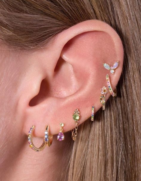 All Eat Piercings, Colorful Ear Stack, Eat Piercing Ideas, Colorful Ear Piercings, Eat Pericing Ideas, Eat Piercings, Ear Stacks, Earring Stacks, Unique Ear Piercings