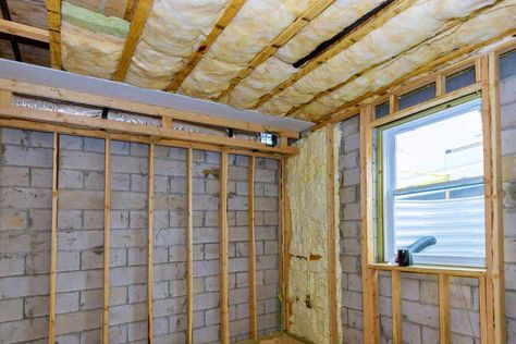 Does A Basement Ceiling Need Insulation? - HVACseer.com Basement Ceiling Insulation, Cheap Insulation, Drop Ceiling Basement, Exposed Basement Ceiling, Basement Insulation, Basement Ceiling Options, Old Basement, Blown In Insulation, Exposed Ceilings