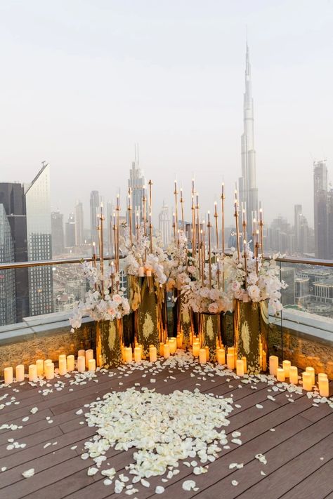 https://www.elegantmoment.ae/gallery/weddings/pearl-of-love.html The Office Proposal, Dubai Proposal Ideas, Wedding Proposal Decor, Proposal Centerpieces, Proposal Floral Decoration, Rooftop Proposal Decorations, Rooftop Party Decorations, Wedding Proposal Decoration Ideas, Candles Proposal