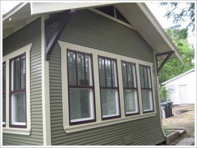 Window trim idea- I like the triple tones around the windows House With Brown Windows, Craftsman Exterior Window Trim, Black Windows Exterior Color Schemes, Tate Olive, Exterior Paint Colours, Craftsman Window, Craftsman Colors, Purple Window, Best Exterior Paint