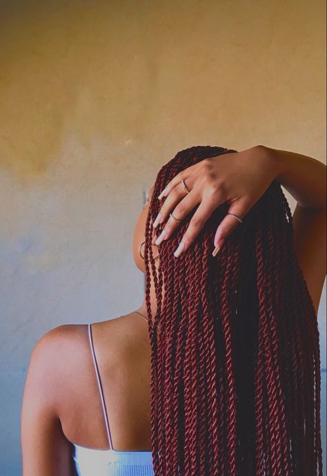 Black girl with red braided Senegalese twists Redbraids For Black Women, Red Twists Braids, Burgandy Braids On Dark Skin, Red Braids Aesthetic, Red Twists Black Women, Dark Red Braids For Black Women, Red Hair Braids Black Women, Red Twist Braids Hairstyles, Wine Red Braids