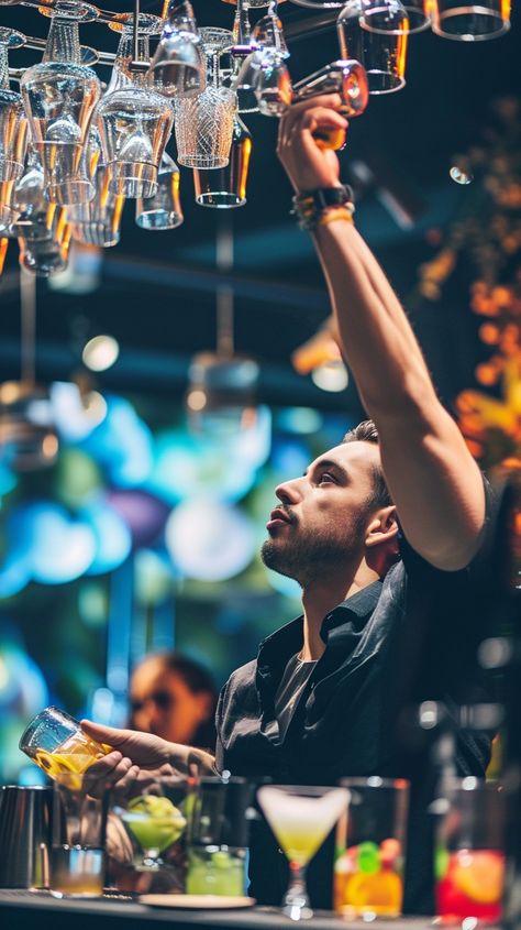 Bartender in Action: A skilled bartender reaches for a glass, preparing a drink with focus and expertise in a vibrant bar. #bartender #bar #cocktail #glassware #nightlife #mixology #drinks #service #aiart #aiphoto #stockcake https://ayr.app/l/BSTB Bartender Photoshoot Ideas, Bartender Aesthetic Male, Male Bartender, Harlow James, Bartender Photography, Bartenders Photography, Bartender Aesthetic, Lauren Blakely, Mixology Drinks