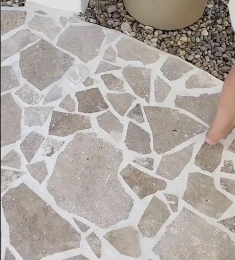 Woman Transforms Old Concrete With DIY Custom Stone Overlay on a Budget - NewsBreak Pouring Concrete Slab, Old Concrete, Coloured Grout, Crazy Paving, Bunny Statue, Concrete Overlay, Dollar Tree Hacks, Patio Fireplace, Poured Concrete