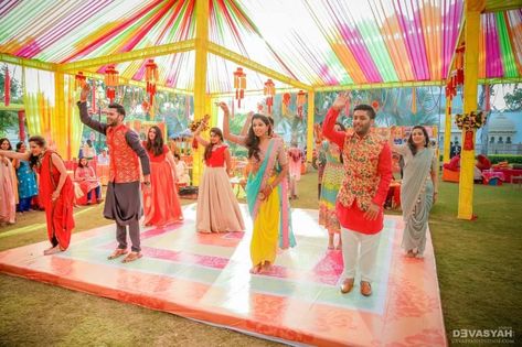 10 Ways To Make Your Sangeet Dance Practice SO Much More Fun! | WedMeGood Mehendi Decor Ideas, Indian Wedding Planner, Sangeet Dance, Dance Stage, Mehndi Decor, Indian Wedding Planning, Wedding Activities, Wedding Planning Websites, Wedding Stage Decorations