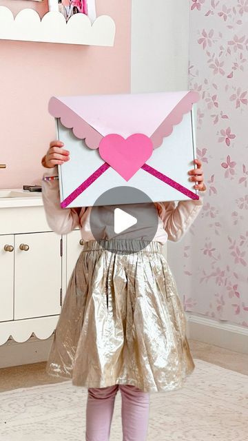 S T E P H ⭐️DIY Creator + Maker on Instagram: "Crafting Love💌 Oversized style with a giant heartfelt Valentine!🫶🏻 + Although I made a pink + purple one for each of my girls doors this one could also be a gift box or even a classroom Valentine “mail box.”However you need to MAKE it - I can’t wait to see! ✨ . Want to MAKE one? . Box (mine is Mini Maker Design Cos craft kit box) Card-stock 12x12 Card-stock (desire colors for details) Sticky back dots Washi tape Scissors Gaffer tape For my exact supplies comment “giant” . Share with someone who’s looking for a unique Valentine craft💜 . . . . . . . . . . #valentinemailbox #valentinegifts #valentinecards #valentinecard #valentineformyvalentine #handmadevalentine #handmadevalentines #howiholiday #holidayswithkids" Valentine Mailbox, Valentine Craft, Gaffer Tape, Valentine Day Boxes, Classroom Valentine, Unique Valentines, Handmade Valentine, Box Card, A Classroom