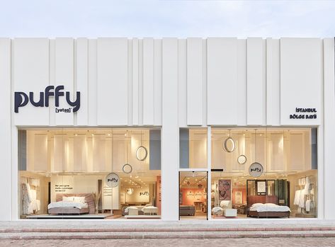 A happy journey from night till morning for everyone... The bed store concept developed by Demirden | ilio for the Puffy brand, offers a simple, expressive, sincere and inspiring new customer experience. The retail strategy of the Puffy brand, which appeals to its young and modern target audience with its accessible, high quality and expert brand positioning, is concretized with the phrase "A happy journey from night till morning for everyone". Modern Store Exterior, Modern Target, Retail Exterior, Furniture Store Design, Happy Journey, Mall Facade, Retail Facade, Commercial Design Exterior, Brand Positioning