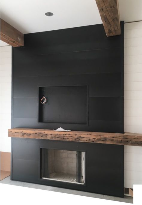 Metal And Wood Fireplace Surround, Modern Industrial Fireplace Ideas, Black Slate Fireplace Wall, Black Stone Veneer Fireplace, Dark Grey Tile Fireplace, Black Wood Panel Fireplace Wall, Black Stone Fireplace Ideas, Dark Tile Fireplace, Black Tile Fireplace Surround