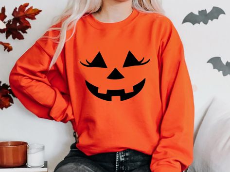 Custom Halloween Sweatshirt, Jack O Lantern Sweatshirt, Pumpkin Sweatshirt, Fall Sweatshirts Halloween Pullover,Cute Spooky Crewneck Sweater A sturdy and warm sweatshirt bound to keep you warm in the colder months. A pre-shrunk, classic fit sweater that's made with air-jet spun yarn for a soft feel and reduced pilling. * 50% cotton, 50% polyester * Pre-shrunk * Classic fit with no center crease * 1x1 athletic rib knit collar with spandex * Air-jet spun yarn with a soft feel and reduced pilling * Funny Pumpkin Faces, Cute Pumpkin Faces, Fall Apparel, Pumpkin Sweatshirt, Jack O'lantern, Pumpkin Sweatshirts, Pumpkin Face, Lantern Design, Halloween Sweater